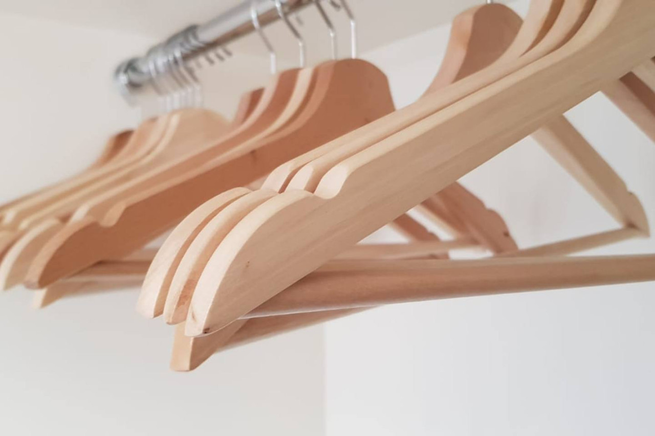 this-large-integrated-wardrobe-comes-with-wooden-hangers-a-large-interior-mirror-and-chest-of-draws.jpg