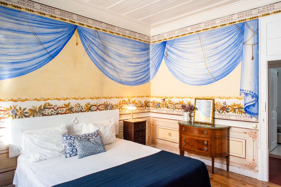 Santo Antonio 1 elegant, antique-style bedroom