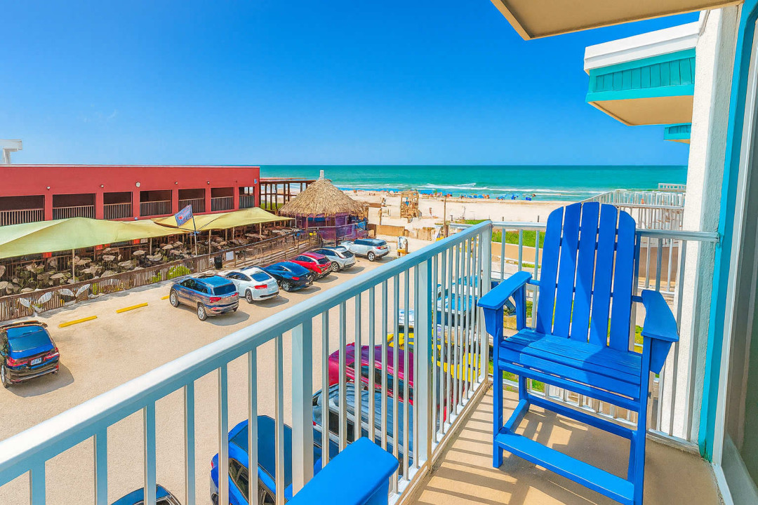 Relax on your balcony with stunning ocean views and fresh sea breezes. Perfect spot to enjoy morning coffee or evening sunsets while overlooking the beach and nearby dining. A serene retreat just steps from the sand.
