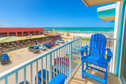 Relax on your balcony with stunning ocean views and fresh sea breezes. Perfect spot to enjoy morning coffee or evening sunsets while overlooking the beach and nearby dining. A serene retreat just steps from the sand.