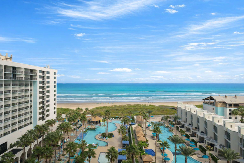 Oceanfront Resort Condo | Pools, Palapas & Balcony Views  
Steps to the beach, lagoon-style pools, palm-lined cabanas, and modern interiors with private balcony. Perfect for families or couples seeking sun and serenity.