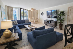 Spacious Coastal Retreat | Steps to Beach | Balcony Views | Modern Decor | Fast WiFi & Smart TV | Dining + Lounge Combo | Ideal for Families & Groups