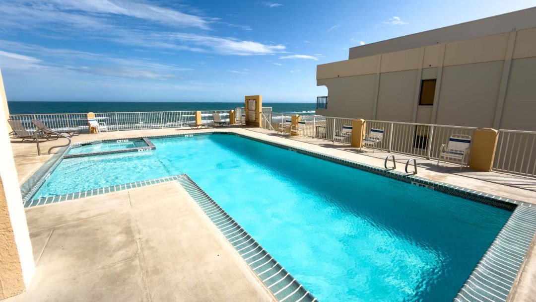 Infinity-Edge Oceanview Pool Paradise
Dive into luxury at this resort-style pool with sparkling lap lanes, bubbling spa, and chaise loungers under sunny skies. Overlook endless Gulf waves crashing ashore—pure bliss! Gated deck ensures privacy.