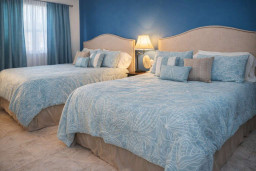 Coastal Comfort | 2 Beds | Deep Blue Accent Wall | Walk to Beach | Stylish Decor | Warm Lighting | Ideal for Families or Friends | Fast Wi-Fi | A/C | Peaceful Retreat in South Padre Island
