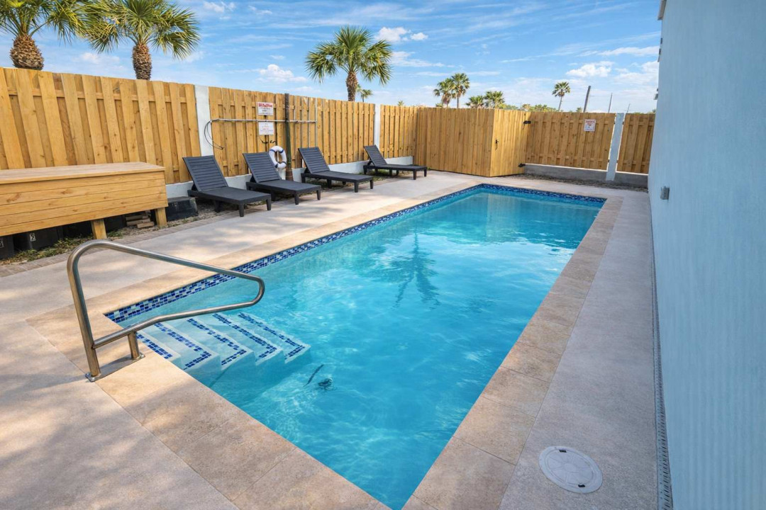 Private Pool Retreat | Lounge Seating | Fenced Yard | Palm Views | Walk to Beach