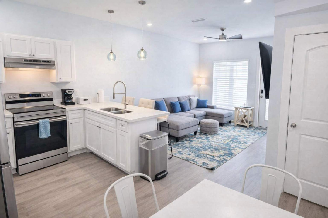 Bright Coastal Retreat | Modern Kitchen + Stylish Living | Steps to Beach & Dining
