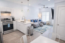 Bright Coastal Retreat | Modern Kitchen + Stylish Living | Steps to Beach & Dining