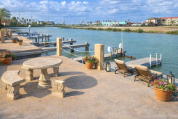 Waterfront Retreat with Private Dock, Boat Lift & Scenic Patio — Steps from Coastal Dining & Fun