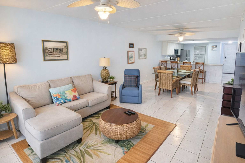 Bright Coastal Retreat | Steps to Beach | Open Layout + Tropical Decor + Full Kitchen