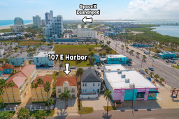 Bayfront & SpaceX View Aerial
Watch SpaceX launches and sunsets from 107 E Harbor overlooking the causeway and bay. Central island location near shops, restaurants, and beach makes this condo an unbeatable launchpad.