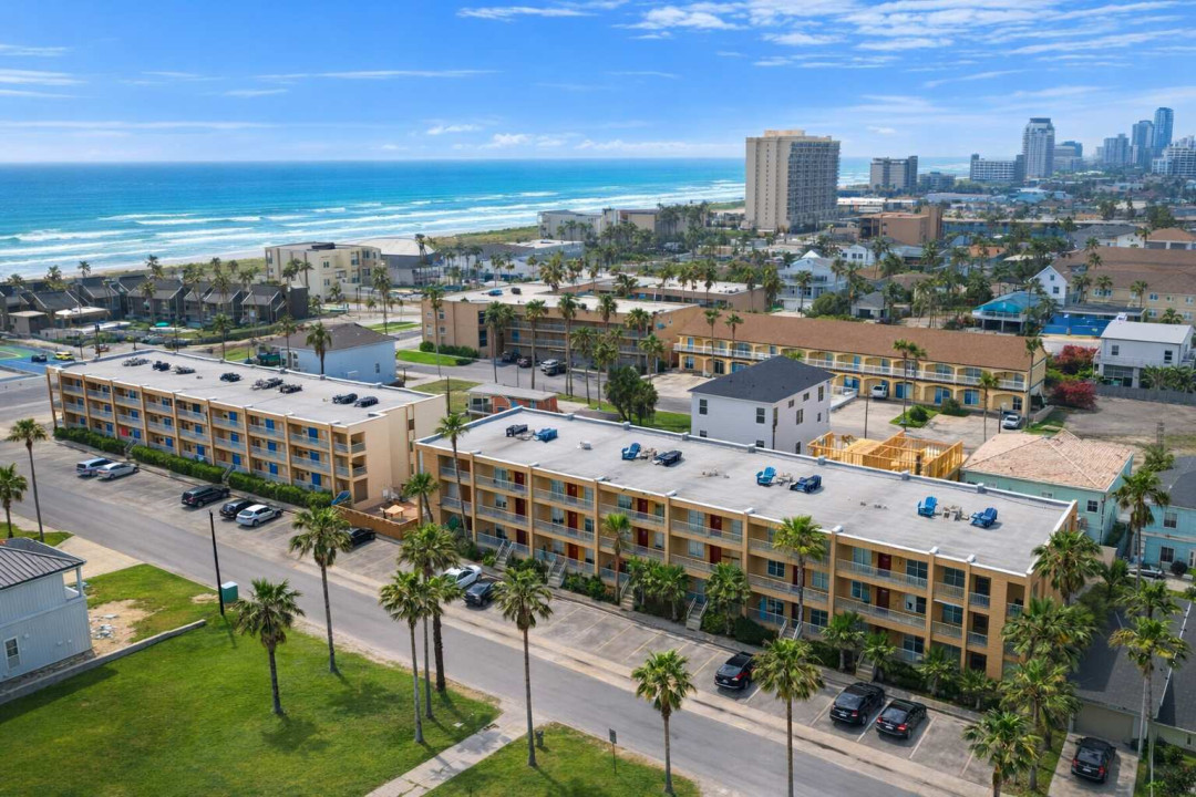 Beachside 3BR Retreat • Steps to Sand • Ocean Views • Parking • Palm-Lined Street • Walk to Dining & Shops