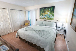 Tropical Retreat | Cozy Bed | Beach Vibes | Private Closets | Armchair Lounge | Bright & Airy | Near Beach & Dining