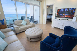 Oceanfront Elegance | Balcony Views | Steps to Beach | Coastal Chic Living Room | Smart TV + Plush Seating | Bright & Breezy Retreat