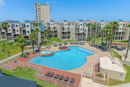 Coastal Retreat with Pool & Ocean Views
Relax in this resort-style townhome with a sparkling pool, lush landscaping and ocean views. Steps from the beach, this coastal escape offers modern amenities, beach & tropical charm.