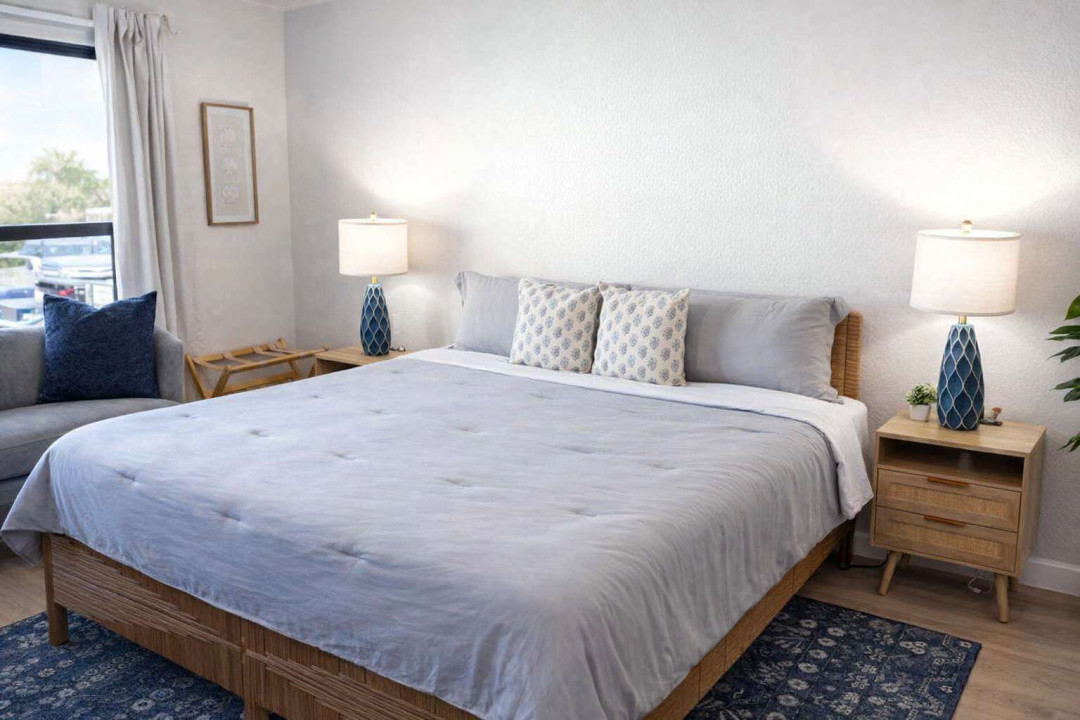 Coastal King Retreat | Bright, Airy Bedroom w/ Beachy Decor, Plush Seating & Dual Nightstands