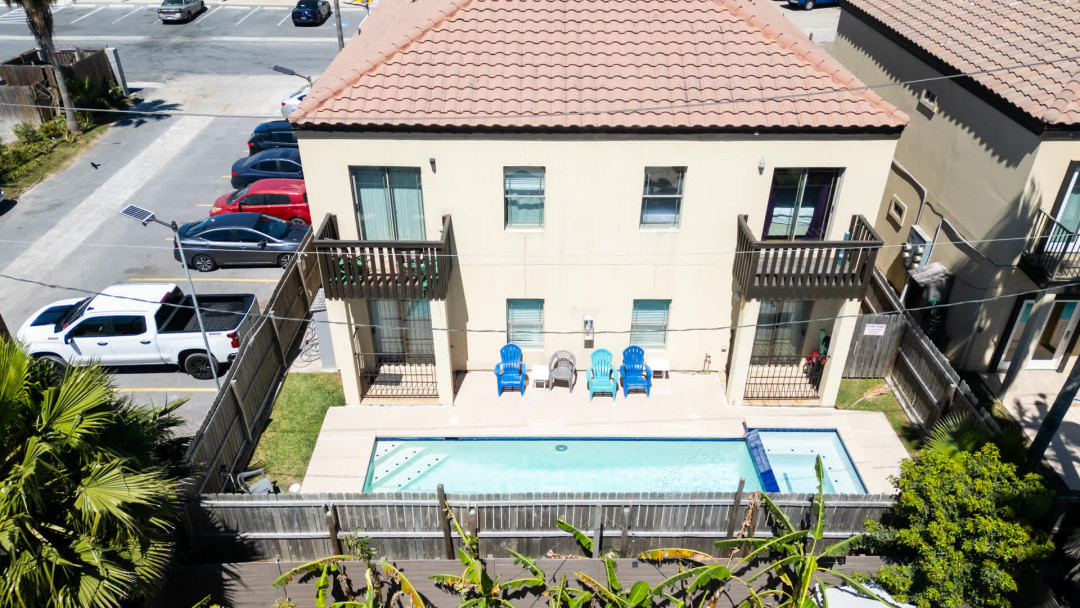 Relax in this bright two‑story retreat featuring a private pool, sun loungers, and lush greenery. Enjoy balcony views, spacious outdoor seating, and a peaceful neighborhood setting—perfect for unwinding after beach days and island adventures.