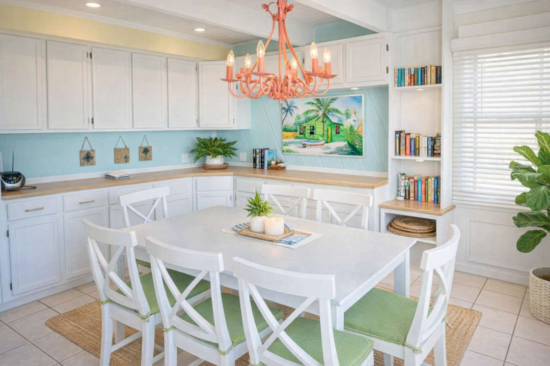 Bright Coastal Dining Retreat | Tropical Art | Pink Chandelier | Books & Games | Family-Friendly