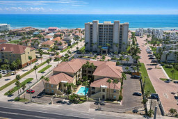 Beachside Retreat with Pool, Palm Views & Walkable Access to Dining, Shops & Oceanfront Fun