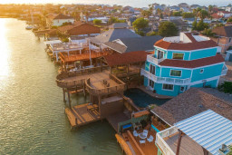 Waterfront Oasis with Multi-Level Decks, Sunset Views & Direct Canal Access – Ideal for Families & Groups