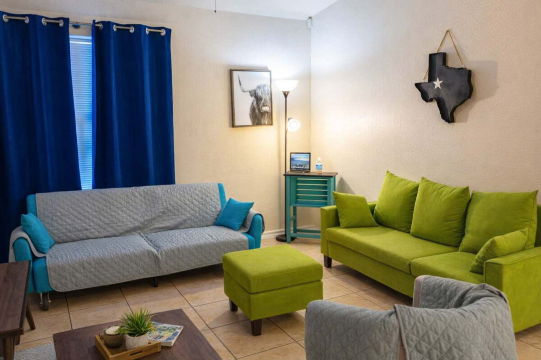 Colorful Living Room Retreat – Bright Sofas, Texas Charm, Cozy Decor, and Natural Light