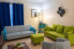 Colorful Living Room Retreat – Bright Sofas, Texas Charm, Cozy Decor, and Natural Light