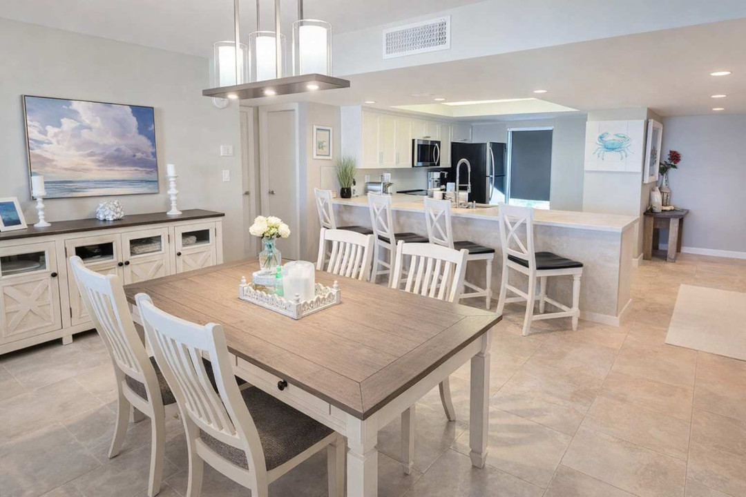 Bright Coastal Kitchen + Dining | Steps to Beach | Family-Friendly | Modern Appliances | Open Layout | Stylish Decor | Fast WiFi | Ideal for Groups & Getaways