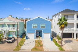 Vibrant Beachfront Trio Cottages Retreat
Discover this stunning beachside gem: a chic blue cottage flanked by pastel pink and crisp white neighbors. Palm-fringed driveways, ocean breezes, and resort vibes await. Ideal for group getaways.