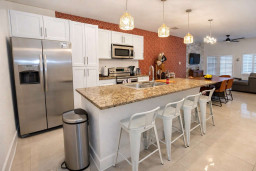 Warm, inviting kitchen where modern design meets effortless comfort — a space that feels instantly familiar yet distinctly refined. Perfect for gathering, cooking, or simply unwinding in style after a day of coastal adventure.