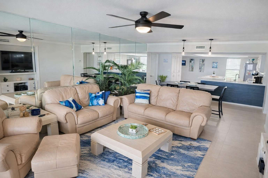Coastal Chic Retreat | Bright Open-Plan Living | Steps to Beach & Dining | Modern Kitchen & Plush Seating | Mirrors & Natural Light | STR-Ready Comfort