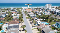 Steps from the sand, this coastal retreat at 113 E. Mesquite blends laid‑back island charm with breezy comfort. Wake to ocean air, stroll to beach access, and unwind in a bright, inviting space made for effortless South Padre days.