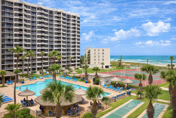 Beachfront resort with ocean views, poolside palapas, tennis courts, and direct beach access—perfect for relaxing getaways or active vacations.