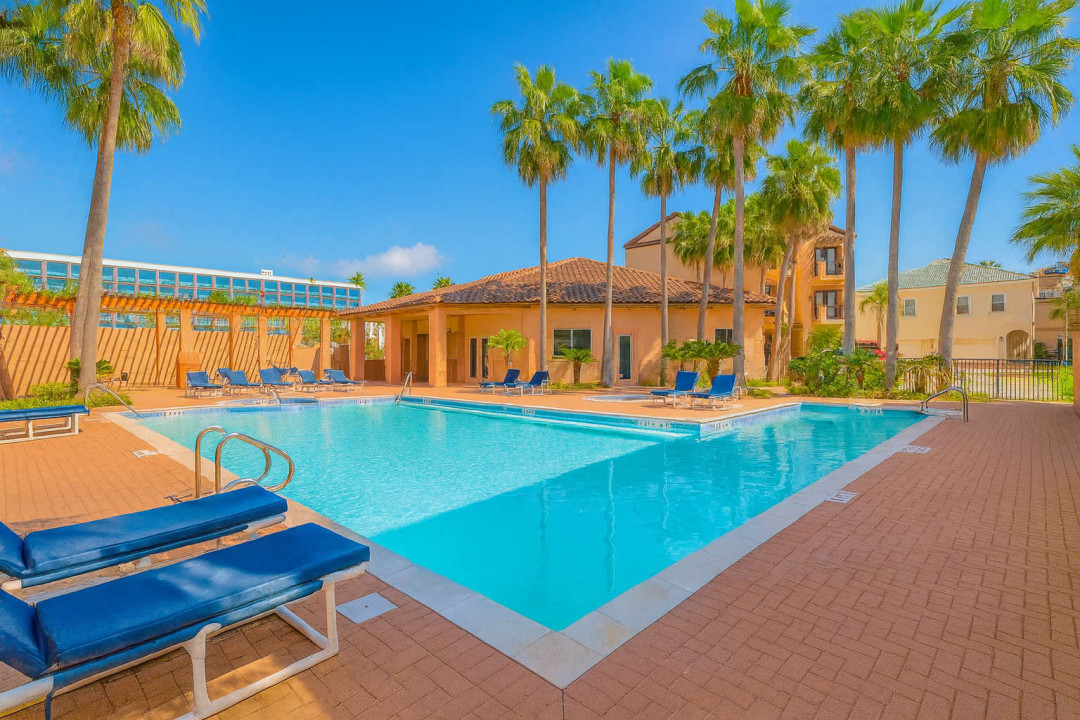  Tropical Poolside Escape with Lounge Seating
Sun-soaked pool retreat with cushioned loungers, palm-lined deck & shaded pavilion. Perfect for relaxing, socializing, soaking up the resort vibe. Steps from stylish accommodations & tropical landscaping.
