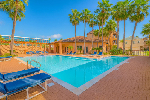  Tropical Poolside Escape with Lounge Seating
Sun-soaked pool retreat with cushioned loungers, palm-lined deck & shaded pavilion. Perfect for relaxing, socializing, soaking up the resort vibe. Steps from stylish accommodations & tropical landscaping.