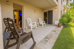 Unwind on the private patio featuring rocking chairs and garden views. With plenty of seating and a peaceful outdoor vibe, it’s the perfect spot to enjoy morning coffee, evening drinks, or simply relax after a day of island adventures.