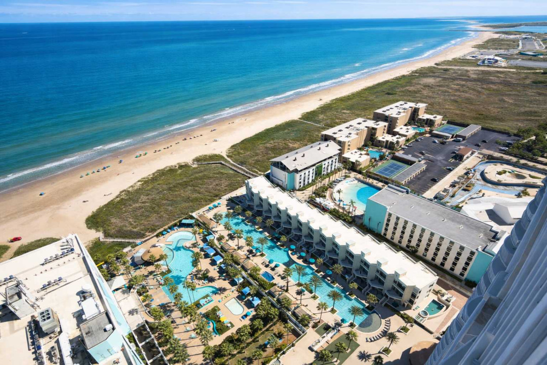 Beachfront resort with panoramic Gulf views, multiple pools, palm-lined walkways, and direct beach access. Spacious balconies, vibrant amenities, and serene coastal vibes—perfect for families or couples seeking a luxury escape.