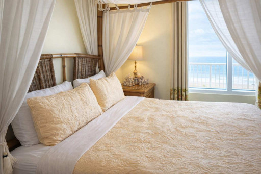 Coastal Canopy Retreat | Ocean View | Steps to Beach
Relax in this breezy, beach-inspired bedroom with a four-poster bed, natural textures, and bright coastal charm. Perfect for couples or solo travelers seeking serenity by the sea.