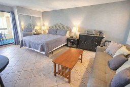 Modern Studio with Balcony & Kitchenette – Steps to Beach, WiFi, Queen Bed, Sofa, Coffee Station