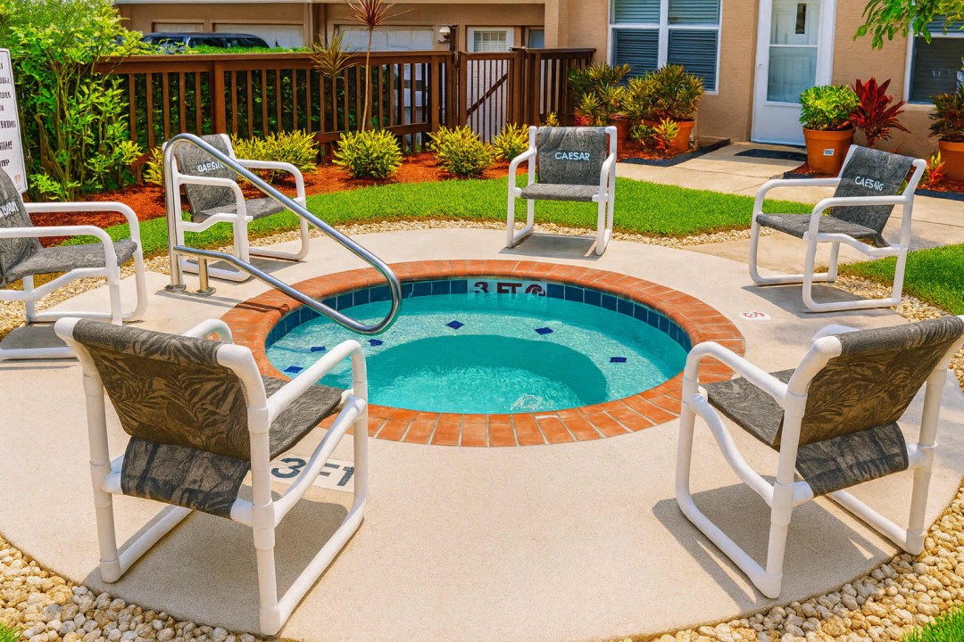 Relax and recharge in the shared spa at Surfside I. Surrounded by comfortable seating and lush gardens, it's the perfect spot to soak, socialize, and unwind after a day at the beach or exploring the coast.