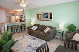 Bright & Breezy Coastal Retreat | Steps to Beach | Stylish Open Kitchen | Sleeps 4 | Fast Wi-Fi | Family-Friendly | Tropical Vibes | Walk to Dining & Shops