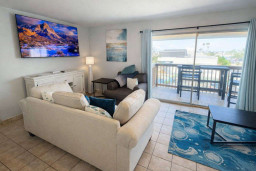Coastal Retreat with Balcony, Smart TV & Stylish Lounge | Steps to Beach & Dining