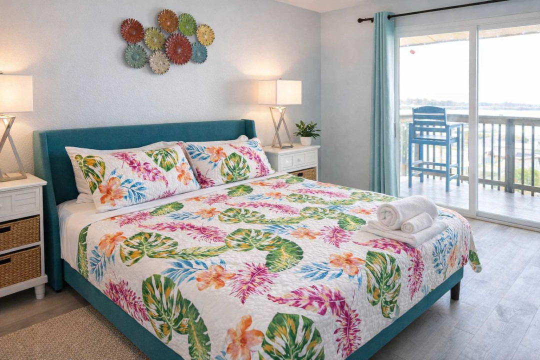 Bright tropical retreat with balcony views, vibrant decor, and natural light—perfect for relaxing getaways near the coast.