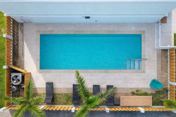 Modern Poolside Retreat | Private Deck, Palm Views & Lounge Seating — Steps from the Beach & Dining