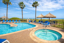 A breezy coastal scene with open sky, calm water, and an easy outdoor rhythm that invites slow moments and relaxed energy. A welcoming spot for guests who enjoy simple surroundings, gentle scenery and a peaceful place to unwind at their own pace.