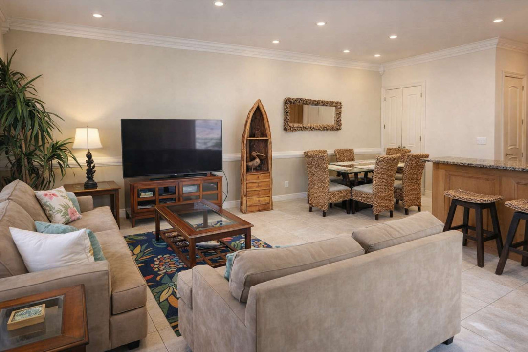 Bright & cozy coastal retreat with vibrant decor, open living-dining layout, tropical accents, and stylish furnishings—perfect for relaxing getaways near the beach.