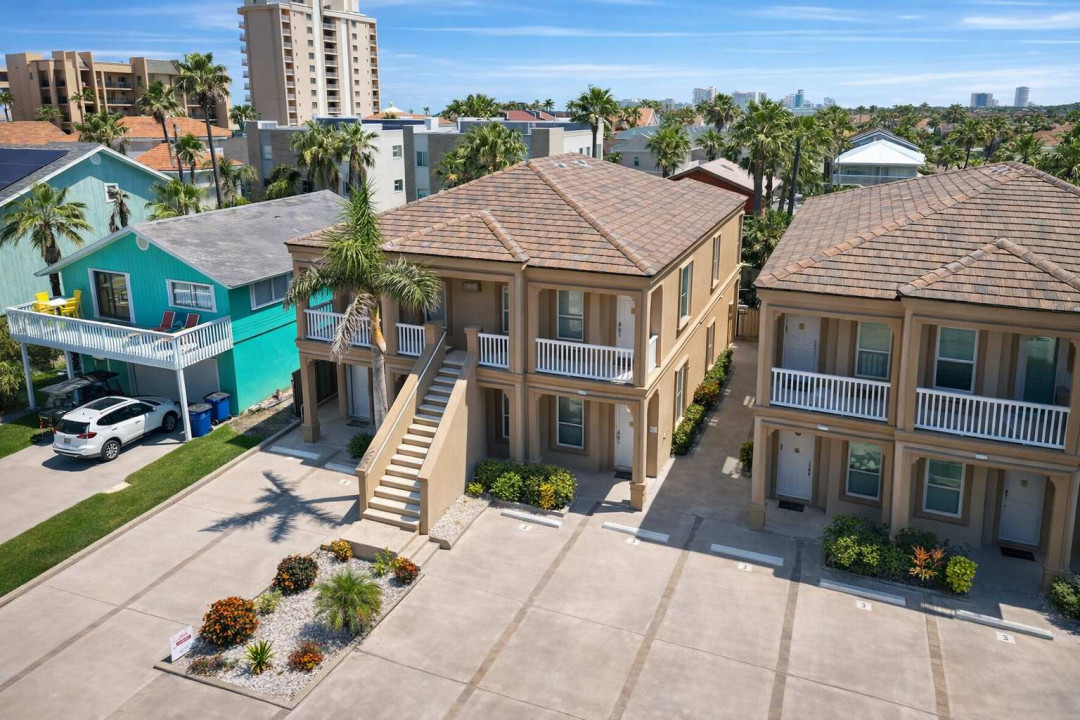 Coastal Townhomes + Vibrant Turquoise Retreat | Walk to Beach | Parking + Balcony Views + Palm Trees