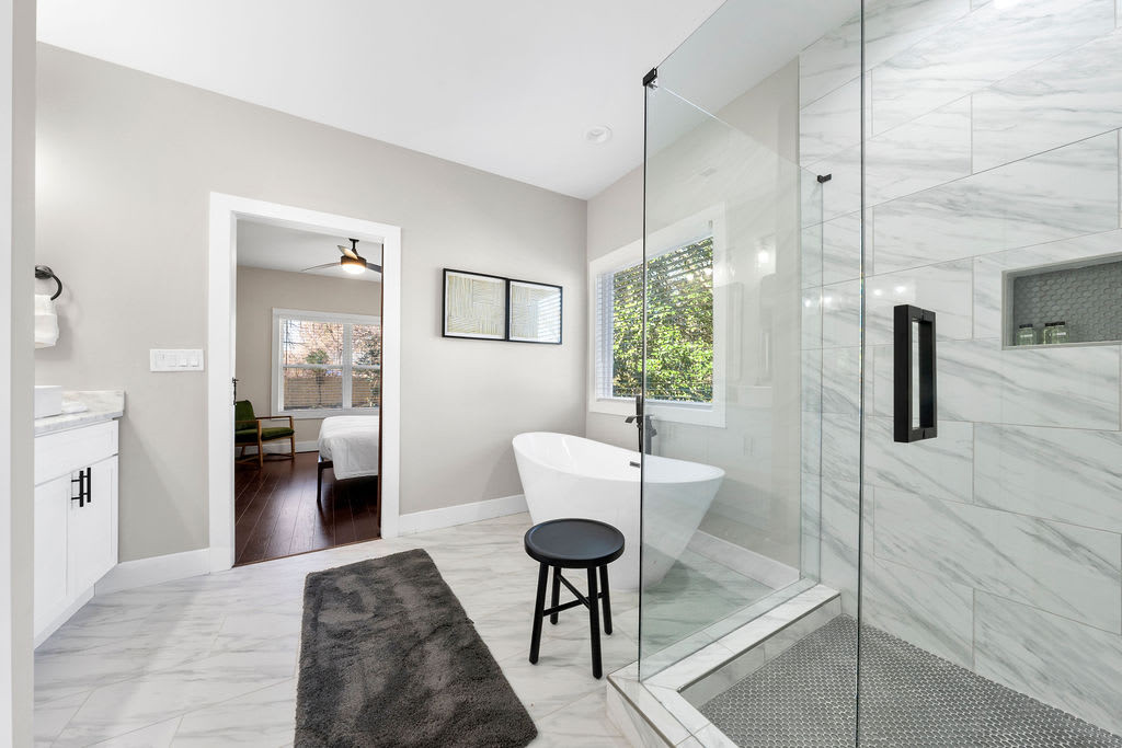 1 of many uxury bathrooms with oversized soaking tub and standalone shower