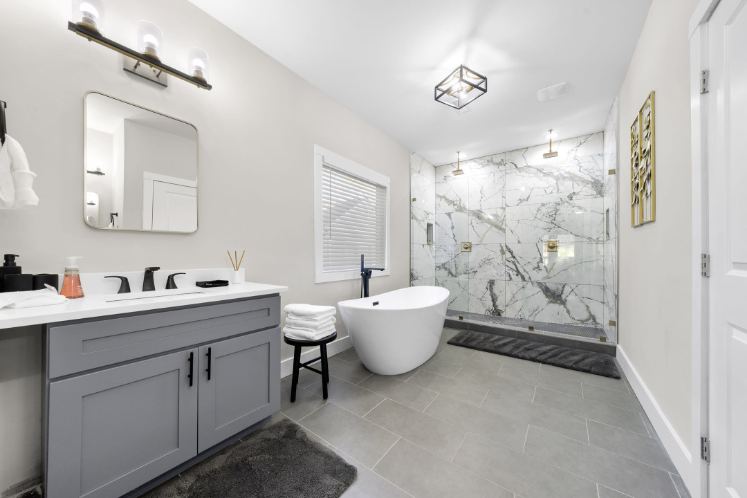 Master Bathroom with luxuries oversized soaking tub and stanalone shower with two showerheads