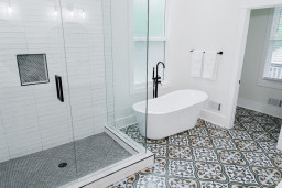 Master bathroom on main - walk in closet, oversized soaking tub, standalone tiled shower. double vanity. 