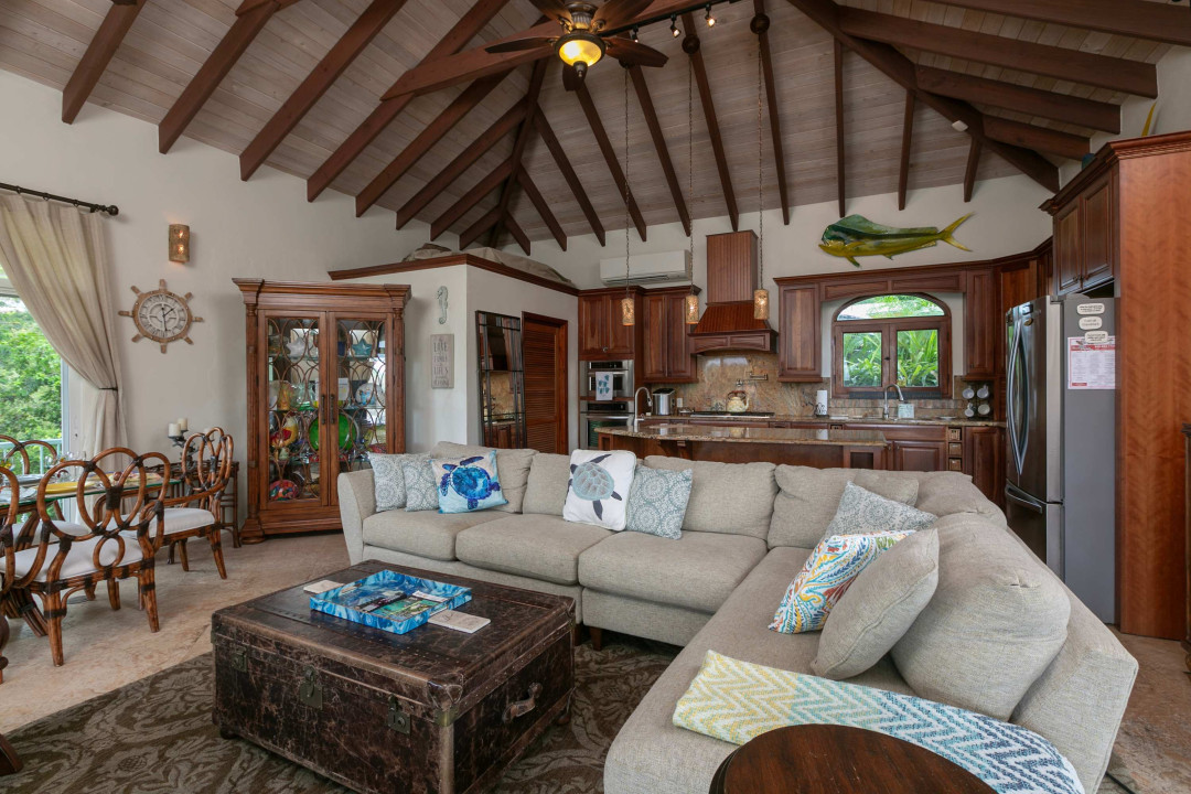 Large indoor living space with kitchen