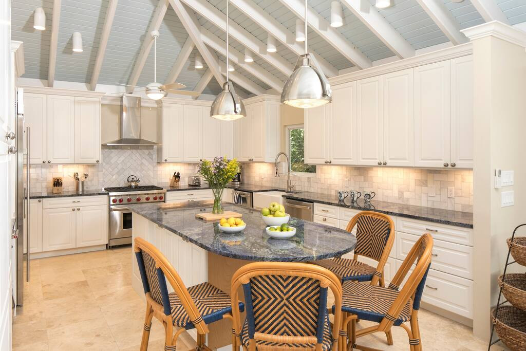 Gourmet kitchen with 2 dishwashers, wine cooler and counter seating